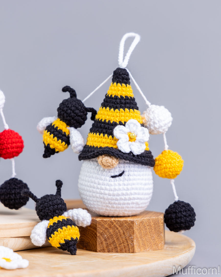 Crochet bee detail on gnome keychain close-u