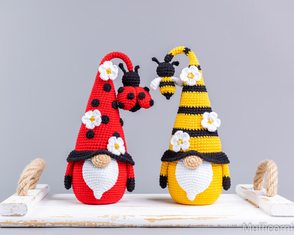 Ladybug and bee gnome amigurumi close-up on table