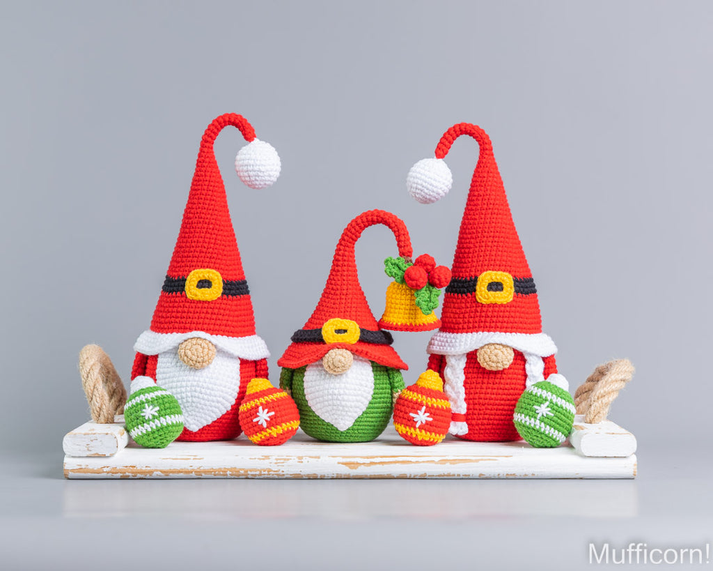 Mr and Mrs Santa gnomes with bell and ball ornament gnome crochet pattern together