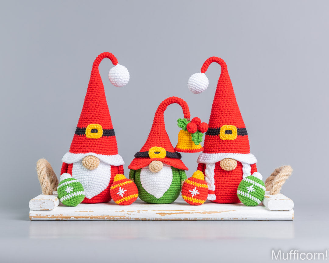 Mr and Mrs Santa gnomes with bell and ball ornament gnome crochet pattern together