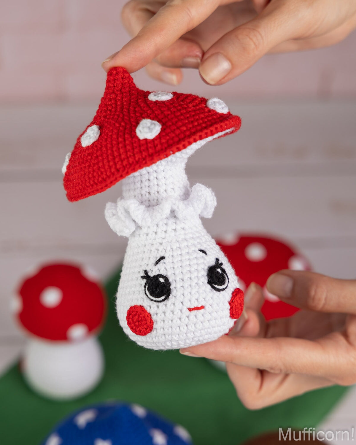 Mushroom girl crochet pattern held in hand