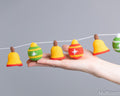 Crochet Christmas bells standing in hand