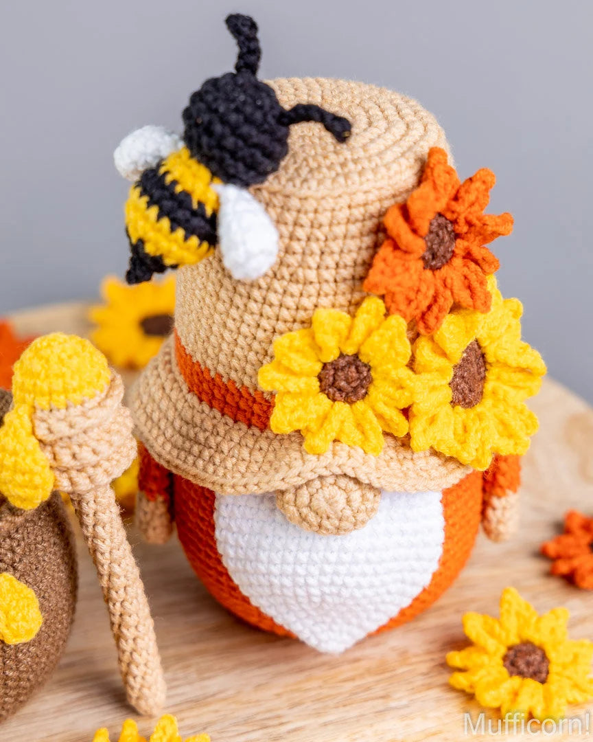 Crochet garden gnome with sunflower amigurumi pattern