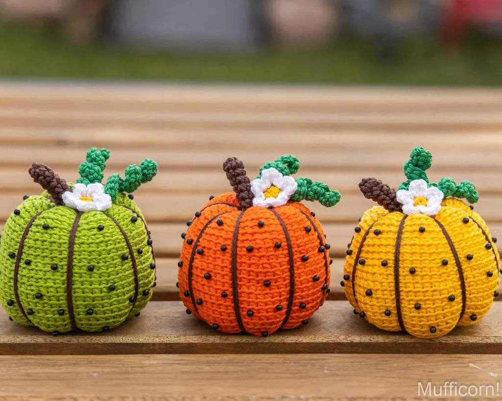 Crochet pumpkin trio on table Thanksgiving decor