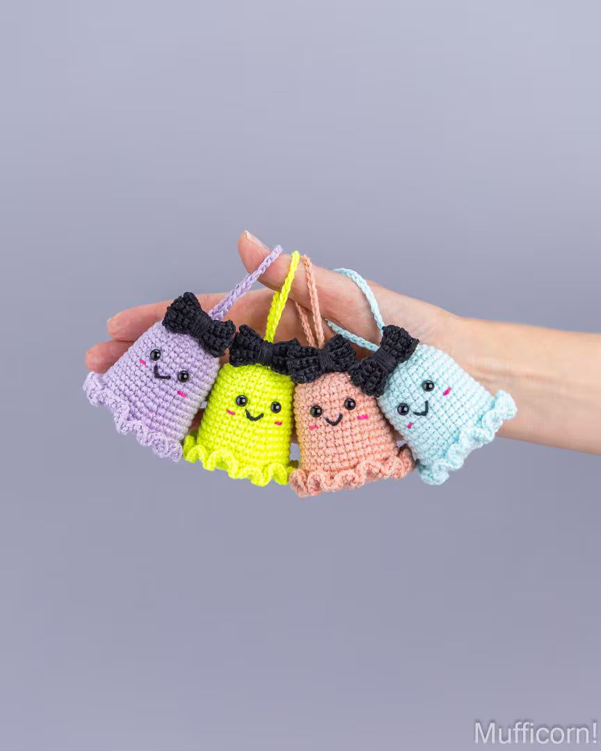 Ghost keychains with a bow