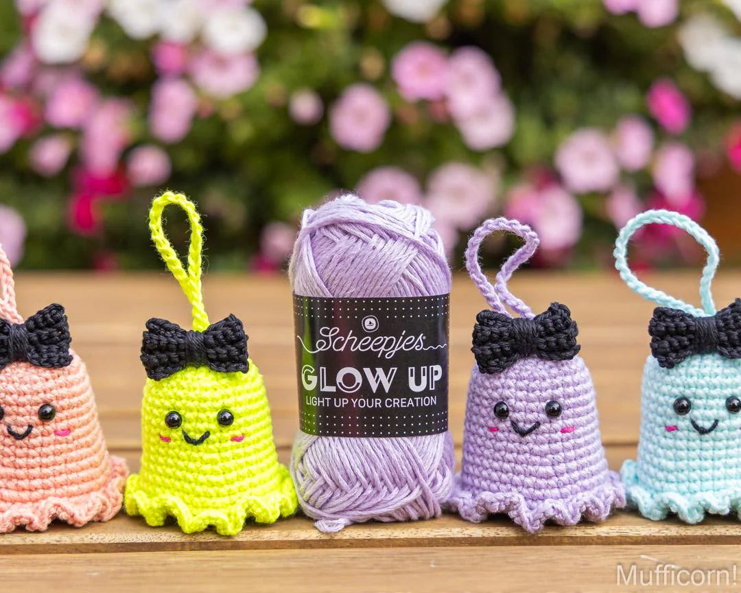 Ghost keychains with a bow