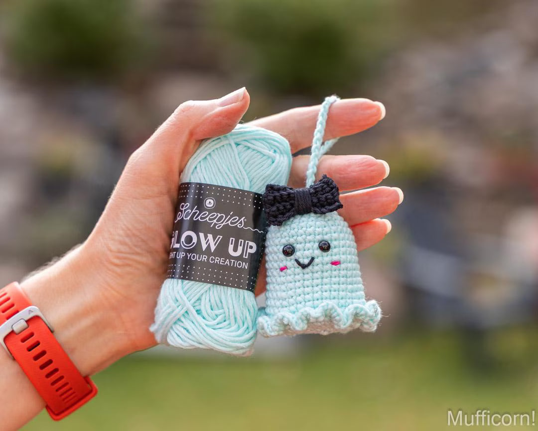 Ghost keychains with a bow