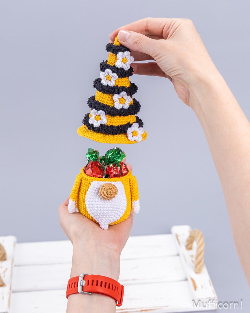 Crochet bee gnome candy keeper on gray background